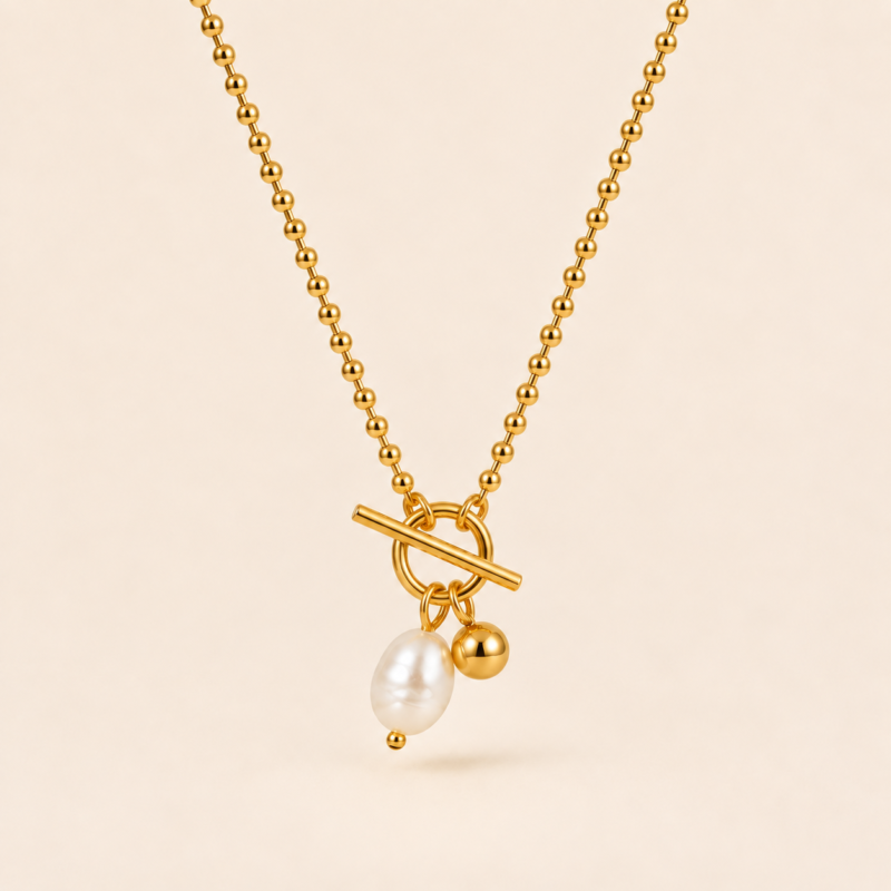 Pearl Toggle Drop Necklace featuring a modern toggle design and luminous pearl accent